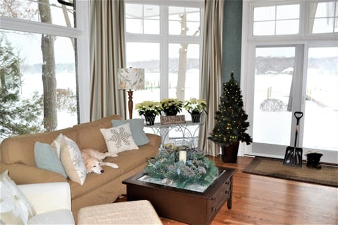 Sunlit Long Island living room with freshly steam-cleaned floor-length curtains framing the windows
